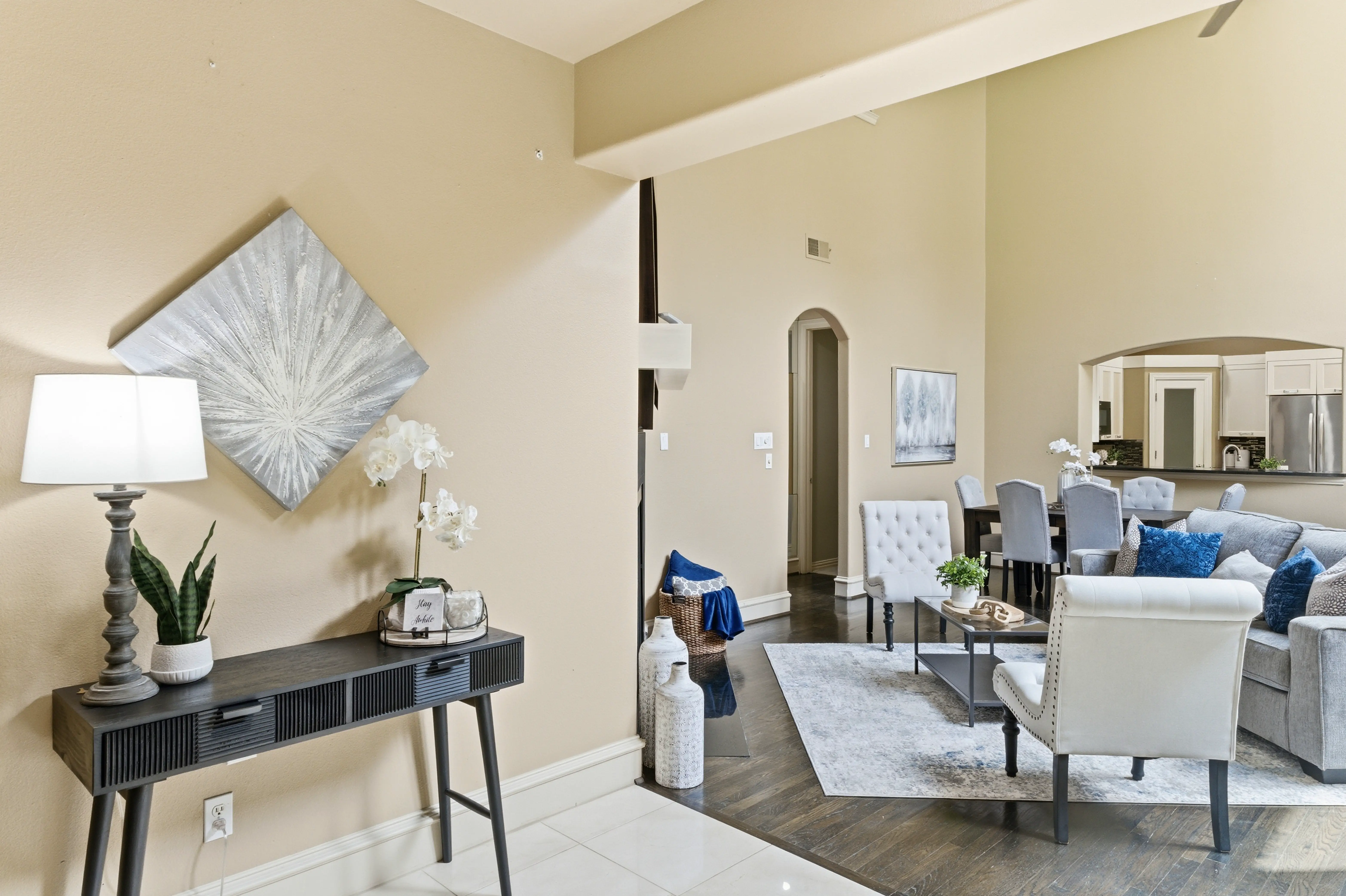 Entry view into living room with high ceilings