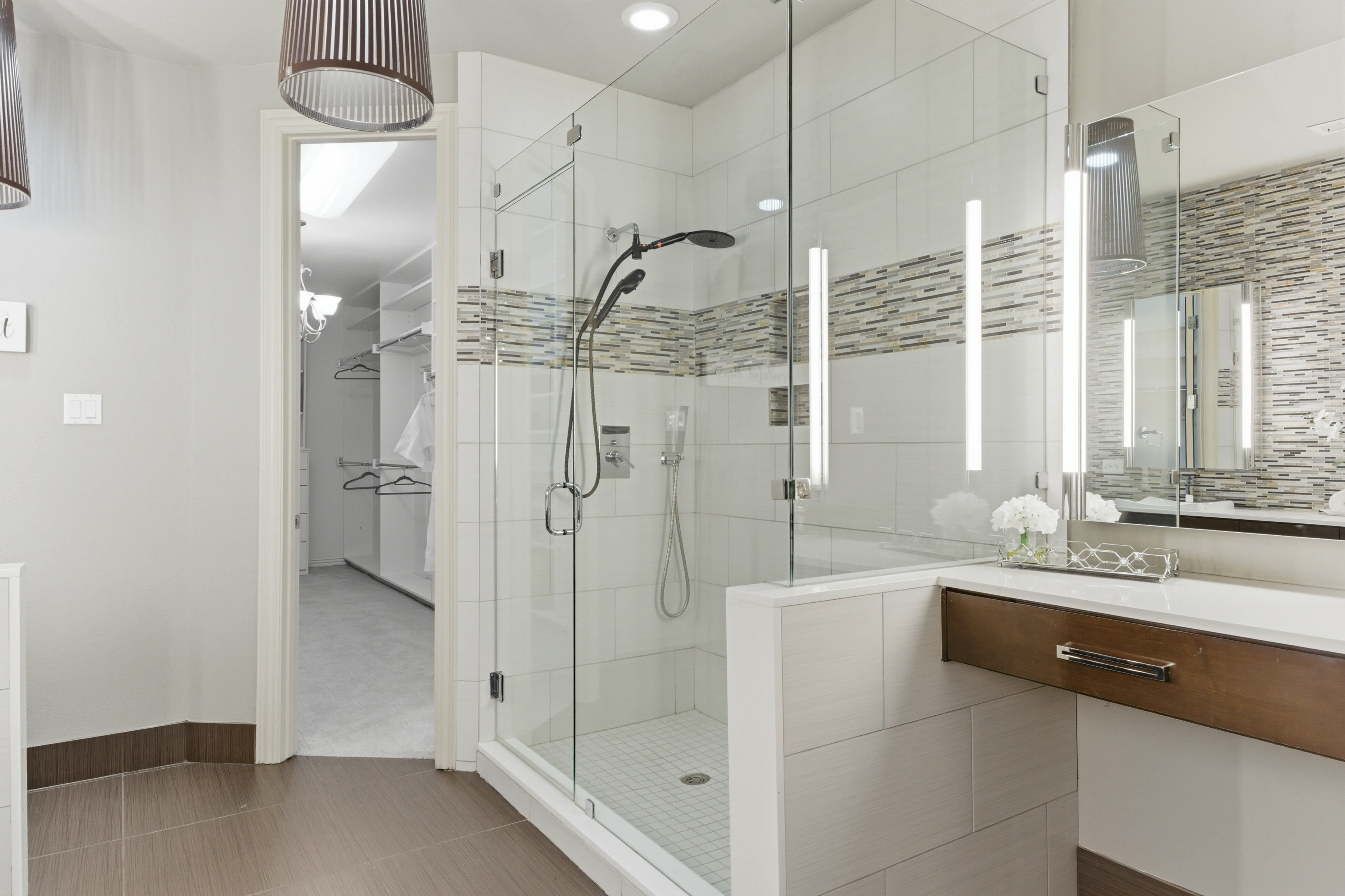 Walk-in shower with tile accents