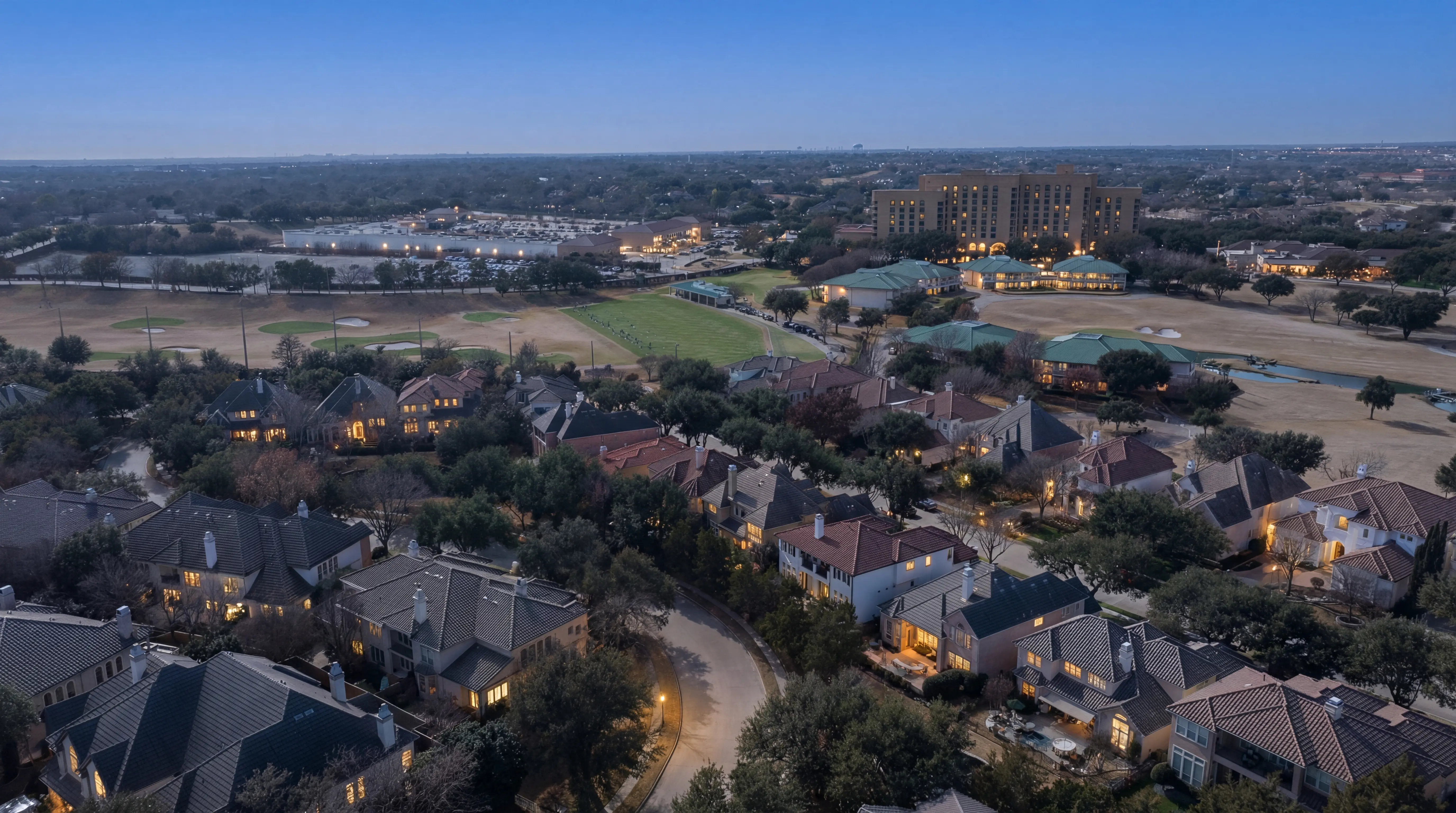 Aerial twilight view of neighborhood