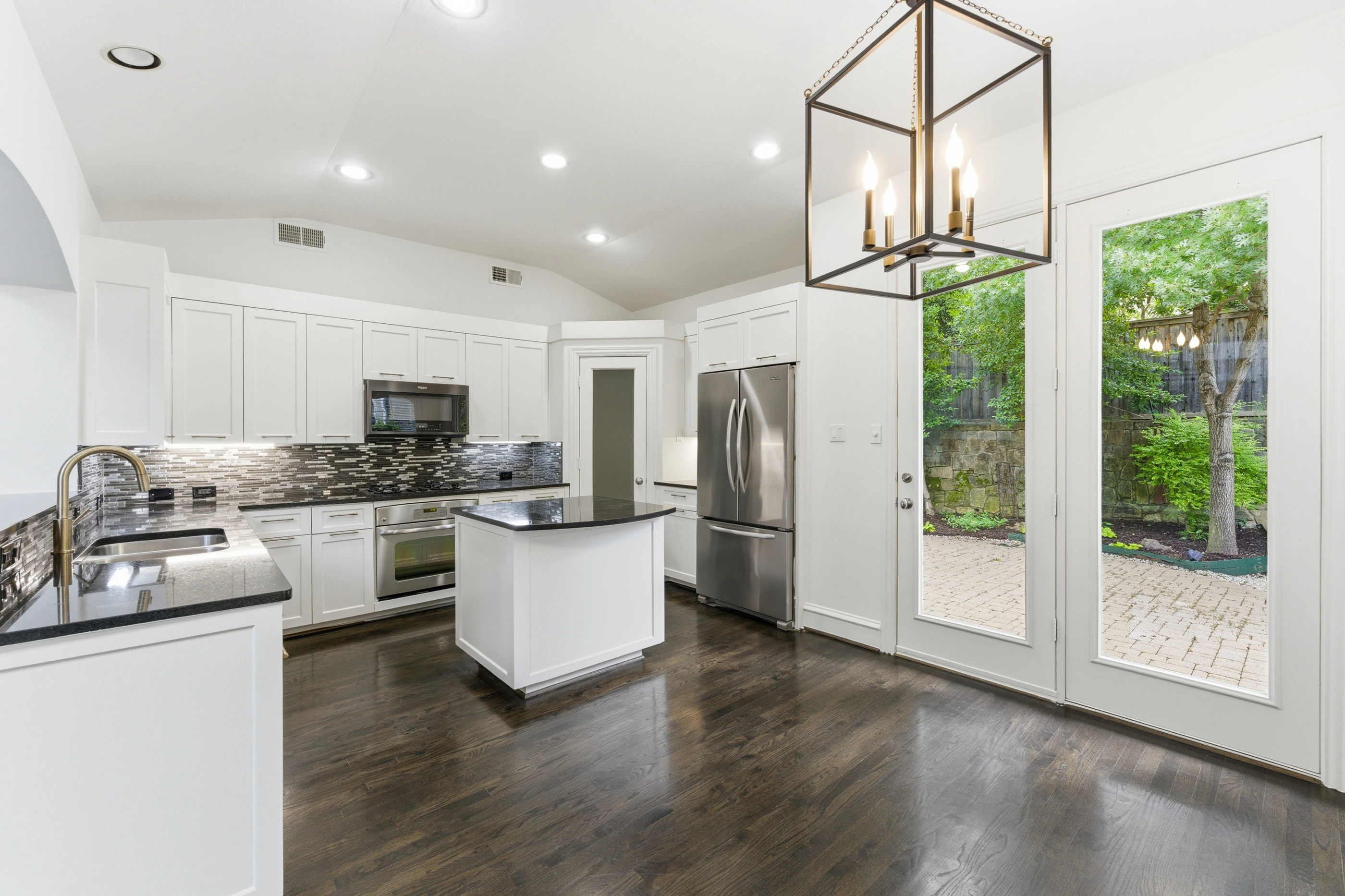 Kitchen with white cabinetry